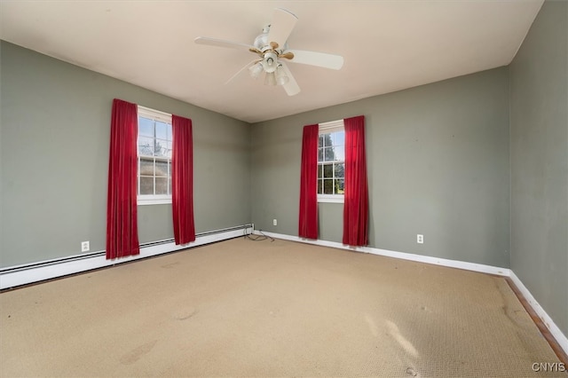 unfurnished room featuring carpet flooring, ceiling fan, and a baseboard heating unit