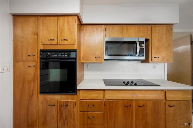 kitchen featuring black appliances