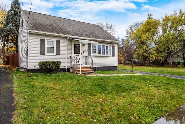 view of front of home with a front lawn