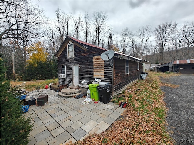 rear view of house with a patio area