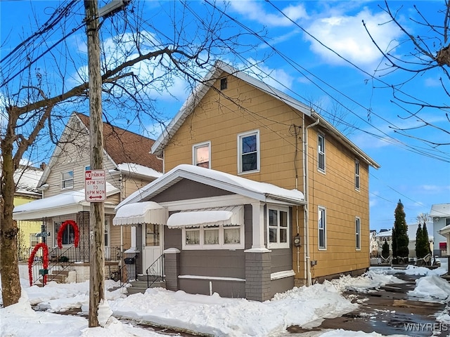 view of snow covered property