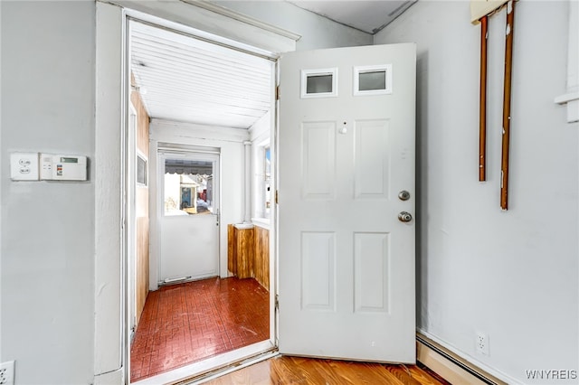 entryway featuring light hardwood / wood-style floors and a baseboard radiator