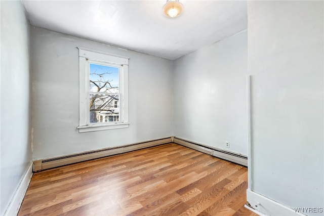 unfurnished room featuring light hardwood / wood-style floors