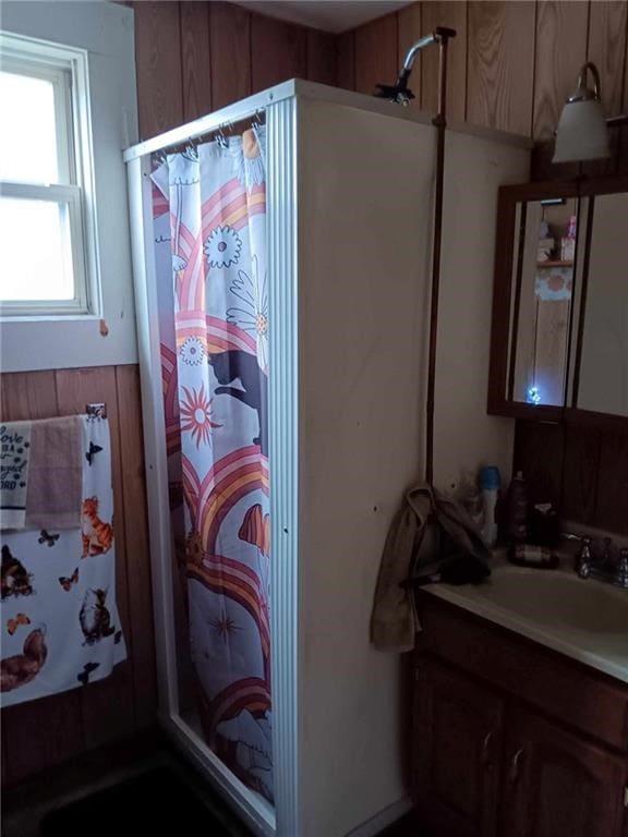 bathroom with vanity and a shower with shower curtain