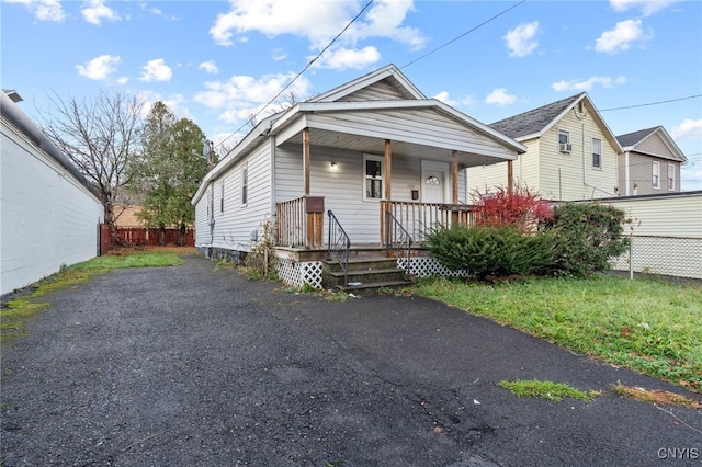 bungalow-style home with a porch