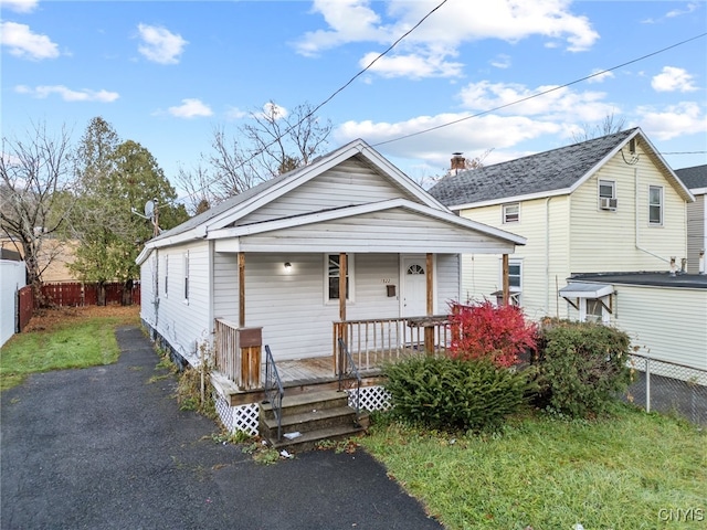 bungalow-style home with a porch