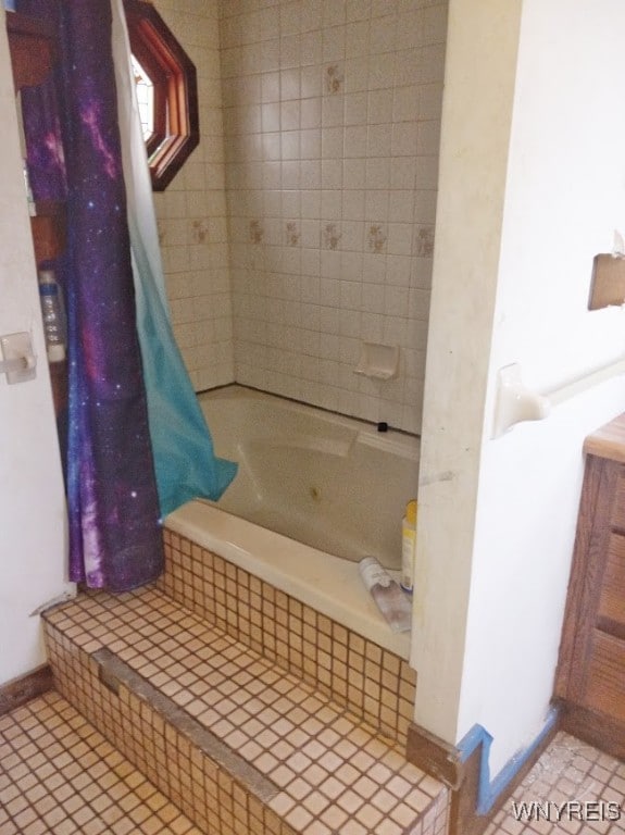 bathroom with tile patterned floors