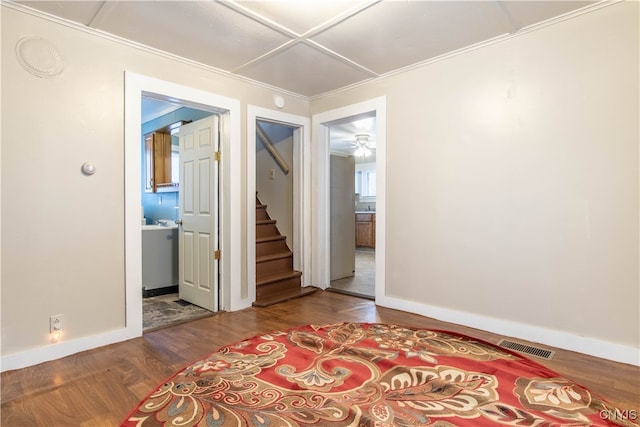 empty room featuring ceiling fan and hardwood / wood-style flooring