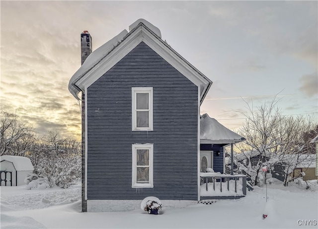 view of snow covered property