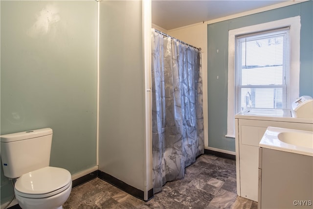 bathroom featuring a shower with curtain, vanity, and toilet