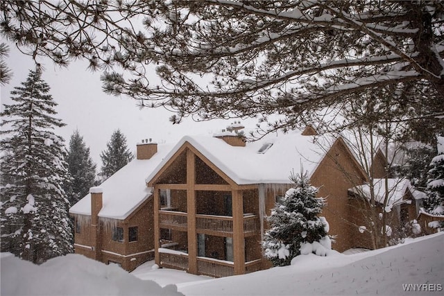 view of snow covered property