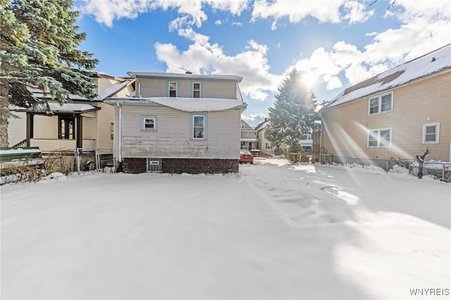 view of snow covered property