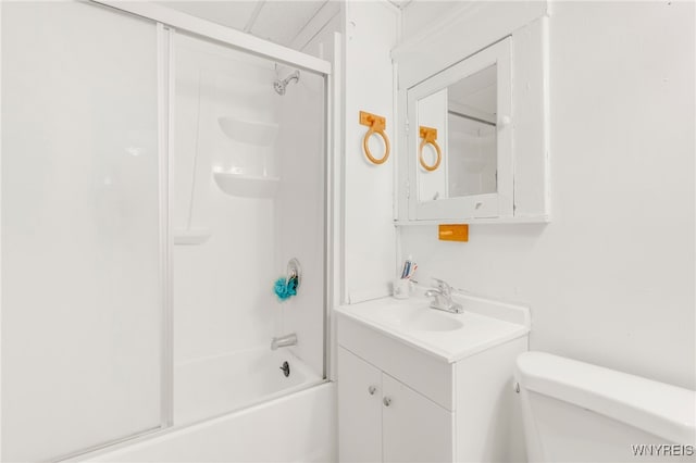 full bathroom with shower / bath combination with glass door, vanity, and toilet