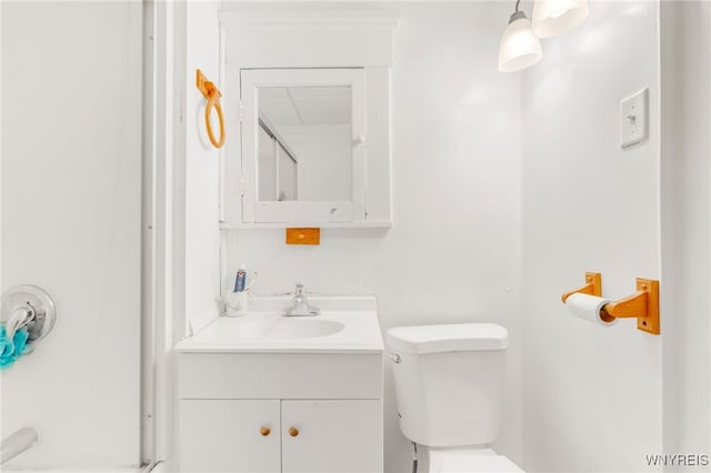 bathroom with vanity and toilet