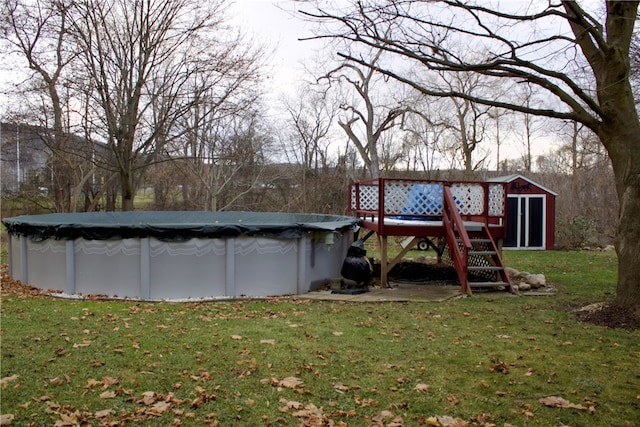 exterior space with a lawn and a storage shed