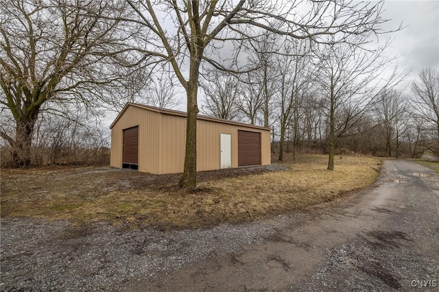 view of outdoor structure featuring a garage