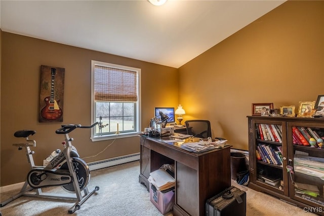 home office featuring carpet floors, vaulted ceiling, and a baseboard heating unit