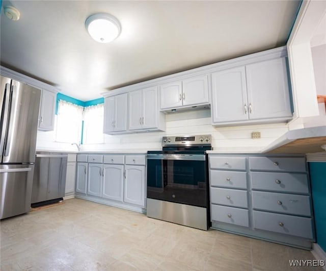 kitchen with white cabinetry and appliances with stainless steel finishes