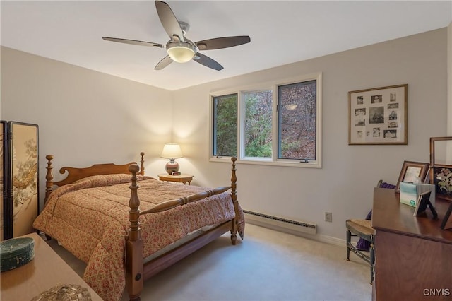 bedroom featuring light carpet, a baseboard radiator, and ceiling fan