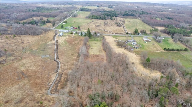 birds eye view of property featuring a rural view