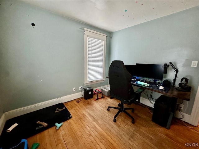 home office featuring hardwood / wood-style flooring