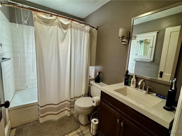 full bathroom featuring vanity, toilet, and shower / tub combo with curtain