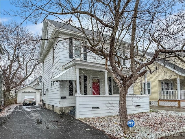 view of front of property with an outbuilding and a garage