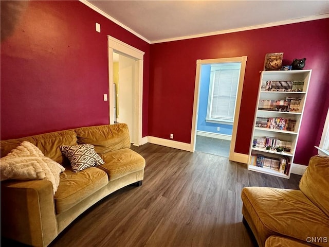 living room featuring wood-type flooring and ornamental molding