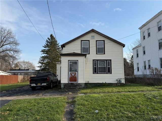 view of front of home with a front lawn