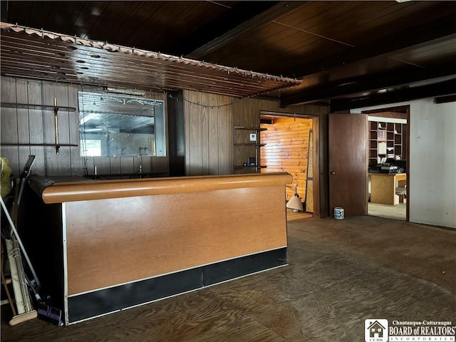 bar featuring wood walls and wood ceiling