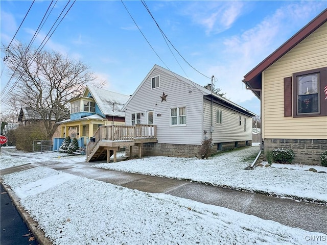 exterior space featuring a wooden deck