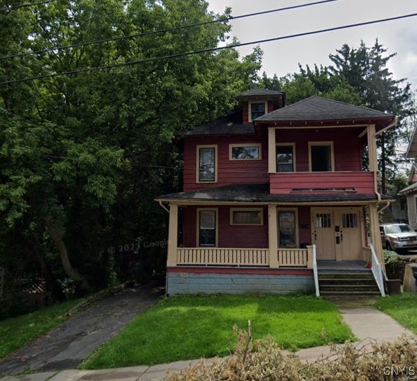 view of front of home featuring covered porch