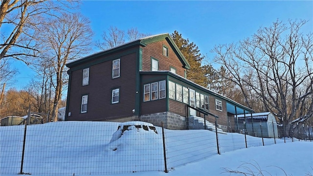 view of snow covered property