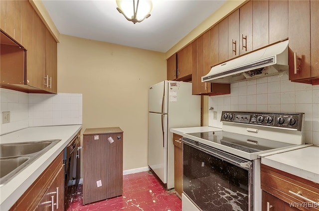 kitchen featuring white range with electric cooktop, sink, and tasteful backsplash