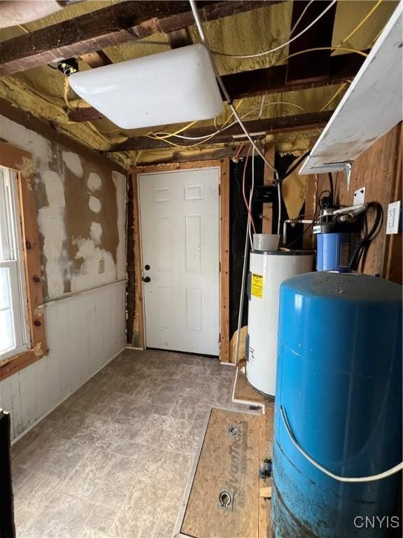 utility room with water heater