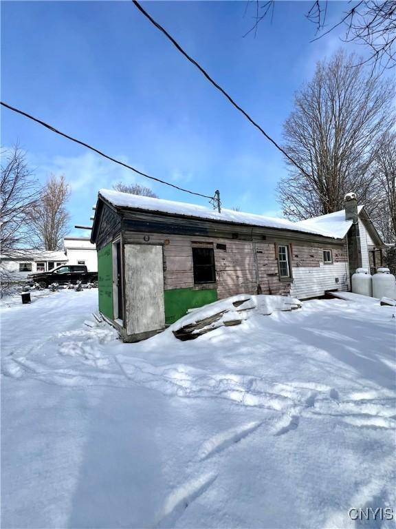 view of snow covered property