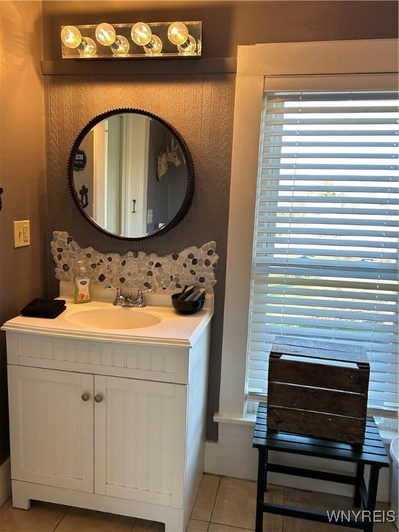 bathroom featuring tile patterned floors and vanity