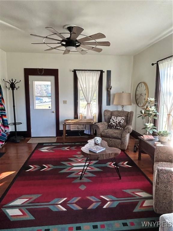 living room with dark hardwood / wood-style floors