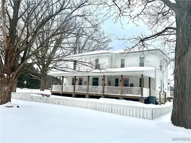 view of front of property featuring covered porch