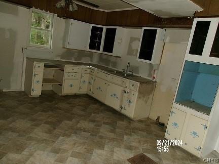 kitchen with white cabinets and sink