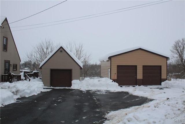 view of snow covered garage