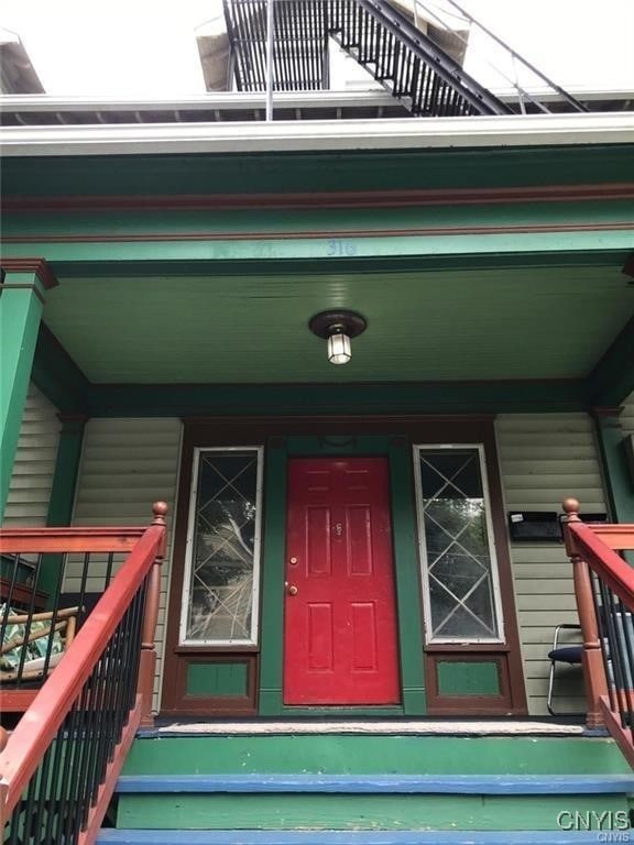 property entrance with a porch