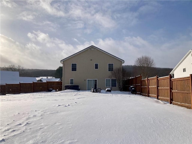 view of snow covered property