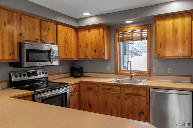 kitchen with stainless steel appliances and sink