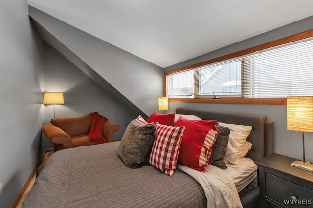 bedroom with vaulted ceiling