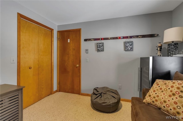 sitting room with carpet flooring