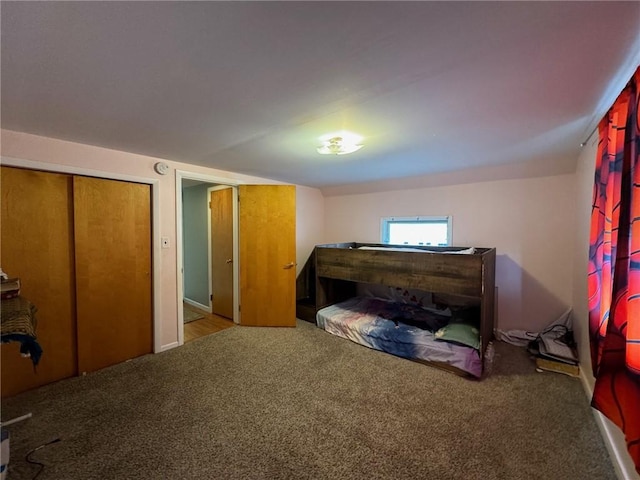 carpeted bedroom with a closet