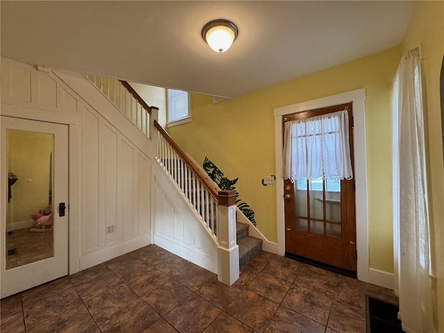 entrance foyer featuring a healthy amount of sunlight