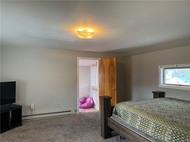 carpeted bedroom featuring a baseboard radiator