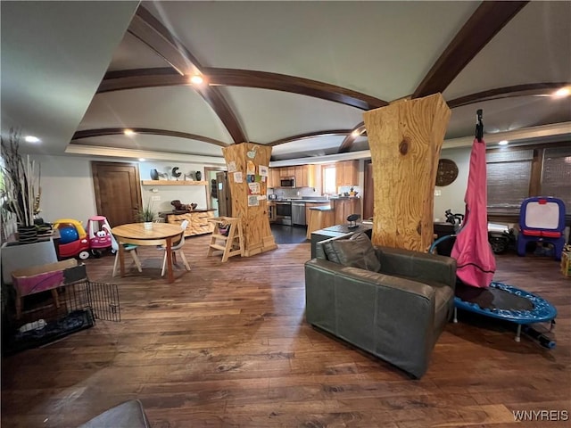 living room with dark hardwood / wood-style flooring and lofted ceiling with beams